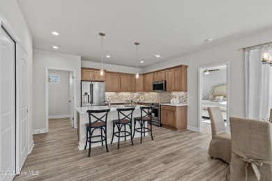 Move In Ready!! Beautiful Capri floorplan w/ extended living on Ocean Ridge Plantation in North Carolina - for sale on GolfHomes.com, golf home, golf lot