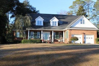 Absolutely gorgeous home, with in ground pool, views of Lake on Santee-Cooper Country Club in South Carolina - for sale on GolfHomes.com, golf home, golf lot