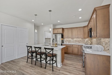 Move In Ready!! Beautiful Capri floorplan w/ extended living on Ocean Ridge Plantation in North Carolina - for sale on GolfHomes.com, golf home, golf lot