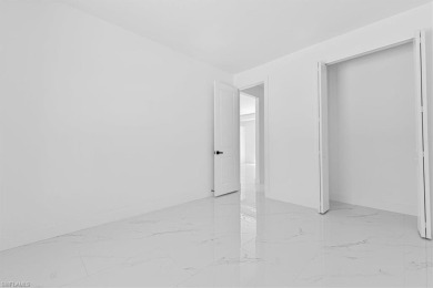 The best-priced BRAND NEW CONSTRUCTION on a HALF-ACRE LOT in on Lehigh Resort Club in Florida - for sale on GolfHomes.com, golf home, golf lot