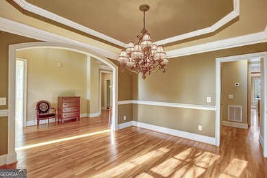 This beautiful house is nestled on 1.7 acres in the coveted on Coweta Club in Georgia - for sale on GolfHomes.com, golf home, golf lot