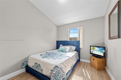 Wow! Beautiful  3-bedroom, 2.5-bathroom Townhouse Located In on Woodmont Country Club in Florida - for sale on GolfHomes.com, golf home, golf lot