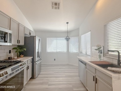 This completely updated Johnson Ranch beauty is giving clean on The Golf Club At Johnson Ranch in Arizona - for sale on GolfHomes.com, golf home, golf lot