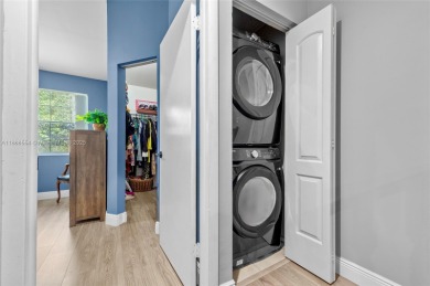 Wow! Beautiful  3-bedroom, 2.5-bathroom Townhouse Located In on Woodmont Country Club in Florida - for sale on GolfHomes.com, golf home, golf lot