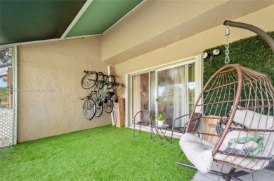 Wow! Beautiful  3-bedroom, 2.5-bathroom Townhouse Located In on Woodmont Country Club in Florida - for sale on GolfHomes.com, golf home, golf lot