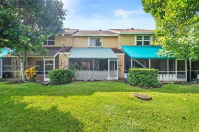 Wow! Beautiful  3-bedroom, 2.5-bathroom Townhouse Located In on Woodmont Country Club in Florida - for sale on GolfHomes.com, golf home, golf lot