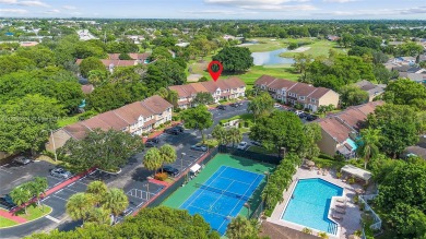 Wow! Beautiful  3-bedroom, 2.5-bathroom Townhouse Located In on Woodmont Country Club in Florida - for sale on GolfHomes.com, golf home, golf lot