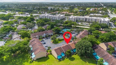 Wow! Beautiful  3-bedroom, 2.5-bathroom Townhouse Located In on Woodmont Country Club in Florida - for sale on GolfHomes.com, golf home, golf lot