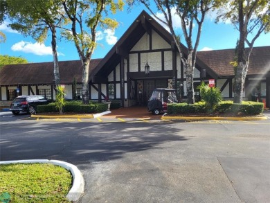 Nestled in a highly desirable International Village, this cozy on Inverrary Country Club in Florida - for sale on GolfHomes.com, golf home, golf lot