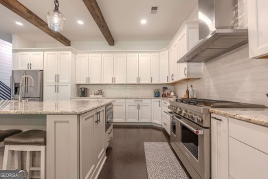 Impeccable craftsmanship end unit Townhome with golf course on Bridgemill Golf Club in Georgia - for sale on GolfHomes.com, golf home, golf lot