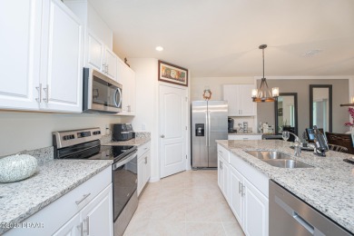Immaculate 2023 Cali Model in Halifax Plantation. Smart home on Halifax Plantation Golf Club in Florida - for sale on GolfHomes.com, golf home, golf lot