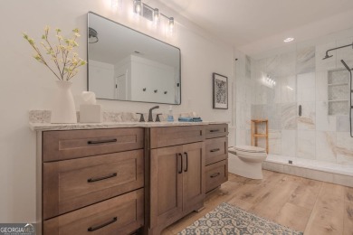 Impeccable craftsmanship end unit Townhome with golf course on Bridgemill Golf Club in Georgia - for sale on GolfHomes.com, golf home, golf lot