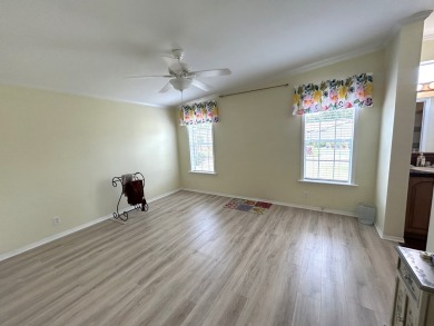 This home is located within a 55+ resort style leased land on Big Cypress Golf and Country Club in Florida - for sale on GolfHomes.com, golf home, golf lot