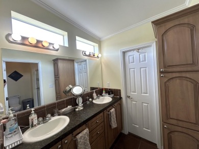 This home is located within a 55+ resort style leased land on Big Cypress Golf and Country Club in Florida - for sale on GolfHomes.com, golf home, golf lot