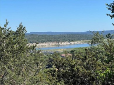 Nestled in the serene and picturesque Lago Vista, this stunning on Highland Lakes Golf Course in Texas - for sale on GolfHomes.com, golf home, golf lot