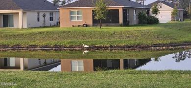 Immaculate 2023 Cali Model in Halifax Plantation. Smart home on Halifax Plantation Golf Club in Florida - for sale on GolfHomes.com, golf home, golf lot