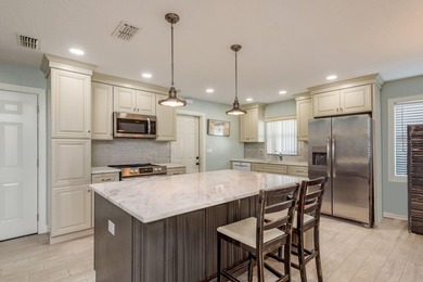 Welcome to your beautifully remodeled villa in the highly on Highland Lakes Executive Golf Course in Florida - for sale on GolfHomes.com, golf home, golf lot