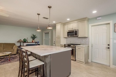 Welcome to your beautifully remodeled villa in the highly on Highland Lakes Executive Golf Course in Florida - for sale on GolfHomes.com, golf home, golf lot