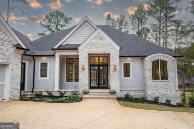 MODERN 2025 CUSTOM GOLF RESIDENCE AT REYNOLDS LAKE OCONEE - on Reynolds Lake Oconee - The Oconee in Georgia - for sale on GolfHomes.com, golf home, golf lot