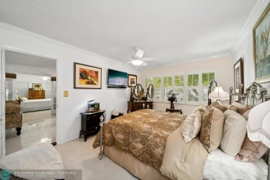 This elegant and tasteful unit features two bedrooms and two on Hollybrook Golf and Tennis Club  in Florida - for sale on GolfHomes.com, golf home, golf lot