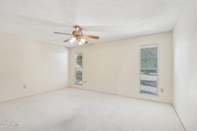 This home is perfectly situated minutes from golf, shopping, and on Stardust Golf Course in Arizona - for sale on GolfHomes.com, golf home, golf lot