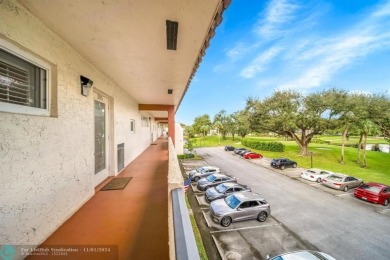 This elegant and tasteful unit features two bedrooms and two on Hollybrook Golf and Tennis Club  in Florida - for sale on GolfHomes.com, golf home, golf lot