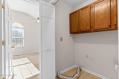 This charming brick home is tucked into an established on Brierwood Golf Club in North Carolina - for sale on GolfHomes.com, golf home, golf lot