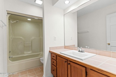 This charming brick home is tucked into an established on Brierwood Golf Club in North Carolina - for sale on GolfHomes.com, golf home, golf lot