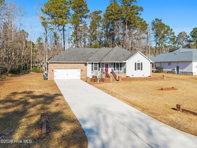 This charming brick home is tucked into an established on Brierwood Golf Club in North Carolina - for sale on GolfHomes.com, golf home, golf lot