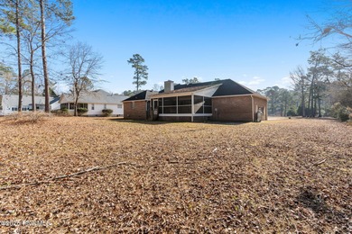 This charming brick home is tucked into an established on Brierwood Golf Club in North Carolina - for sale on GolfHomes.com, golf home, golf lot