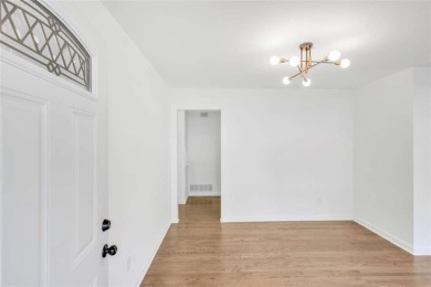 This charming 3-bedroom, 2-bath, 4-sided brick ranch in on Browns Mill Golf Course in Georgia - for sale on GolfHomes.com, golf home, golf lot