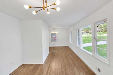 This charming 3-bedroom, 2-bath, 4-sided brick ranch in on Browns Mill Golf Course in Georgia - for sale on GolfHomes.com, golf home, golf lot