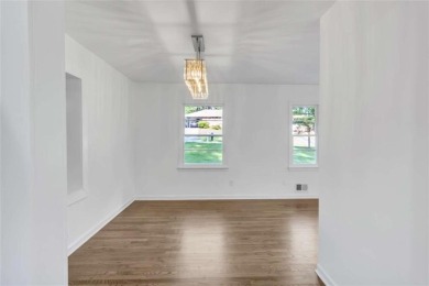 This charming 3-bedroom, 2-bath, 4-sided brick ranch in on Browns Mill Golf Course in Georgia - for sale on GolfHomes.com, golf home, golf lot