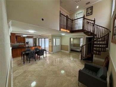 Nestled in a prestigious golf community, this beautifully on  in Florida - for sale on GolfHomes.com, golf home, golf lot