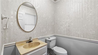 Located in the sought-after Pine Ridge Country Club Estates on Collins Hill Golf Club in Georgia - for sale on GolfHomes.com, golf home, golf lot