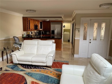 Nestled in a prestigious golf community, this beautifully on  in Florida - for sale on GolfHomes.com, golf home, golf lot