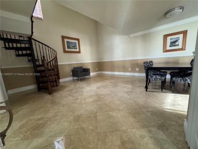 Nestled in a prestigious golf community, this beautifully on  in Florida - for sale on GolfHomes.com, golf home, golf lot