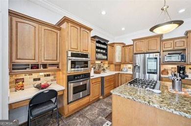 Welcome to this expansive executive-style estate, perfectly on Meadow Lakes Golf Course in Georgia - for sale on GolfHomes.com, golf home, golf lot
