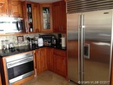 Nestled in a prestigious golf community, this beautifully on  in Florida - for sale on GolfHomes.com, golf home, golf lot