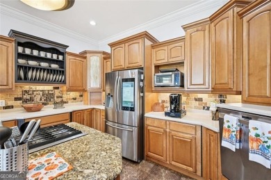Welcome to this expansive executive-style estate, perfectly on Meadow Lakes Golf Course in Georgia - for sale on GolfHomes.com, golf home, golf lot