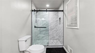 Located in the sought-after Pine Ridge Country Club Estates on Collins Hill Golf Club in Georgia - for sale on GolfHomes.com, golf home, golf lot