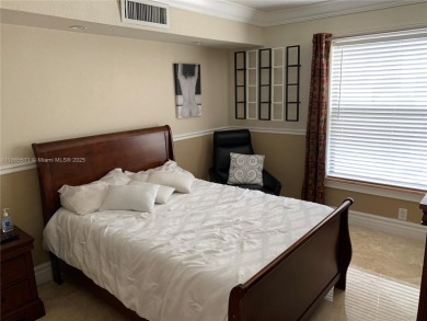 Nestled in a prestigious golf community, this beautifully on  in Florida - for sale on GolfHomes.com, golf home, golf lot