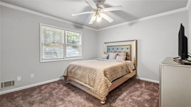 Located in the sought-after Pine Ridge Country Club Estates on Collins Hill Golf Club in Georgia - for sale on GolfHomes.com, golf home, golf lot