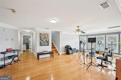 Welcome to this expansive executive-style estate, perfectly on Meadow Lakes Golf Course in Georgia - for sale on GolfHomes.com, golf home, golf lot