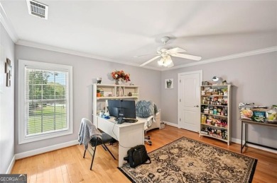 Welcome to this expansive executive-style estate, perfectly on Meadow Lakes Golf Course in Georgia - for sale on GolfHomes.com, golf home, golf lot
