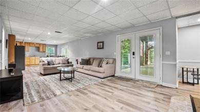 Located in the sought-after Pine Ridge Country Club Estates on Collins Hill Golf Club in Georgia - for sale on GolfHomes.com, golf home, golf lot