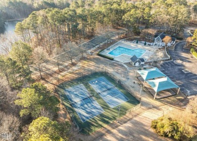 Welcome to this beautifully updated 3-bedroom, 2-bath on Hedingham Golf and Athletic Club in North Carolina - for sale on GolfHomes.com, golf home, golf lot