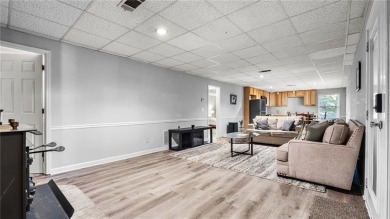 Located in the sought-after Pine Ridge Country Club Estates on Collins Hill Golf Club in Georgia - for sale on GolfHomes.com, golf home, golf lot