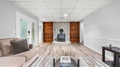 Located in the sought-after Pine Ridge Country Club Estates on Collins Hill Golf Club in Georgia - for sale on GolfHomes.com, golf home, golf lot