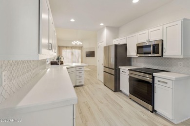 Turn-key, stunningly remodeled San Remo villa in the highly on Oakwood Golf Club  in Arizona - for sale on GolfHomes.com, golf home, golf lot